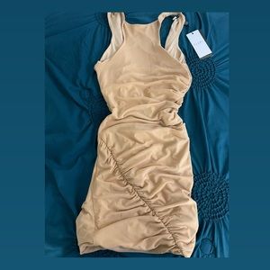 Nude mini club London dress
